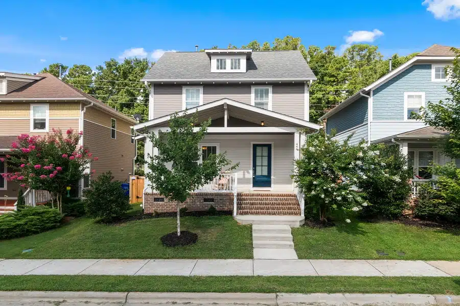 A small two-story house in a residential area