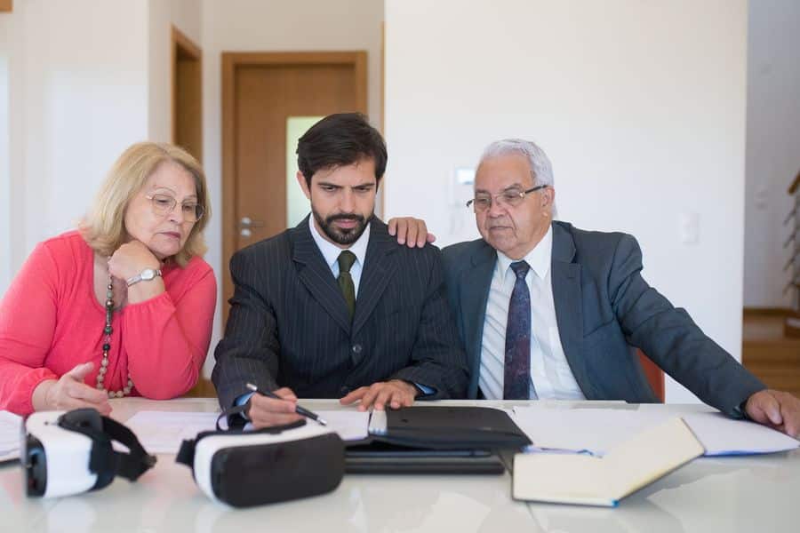 Couple trying to negotiate with an agent for their Toll Brothers housing plan