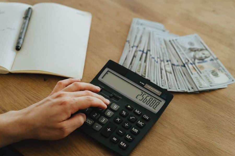 Person calculating the downpayment needed for a house in California