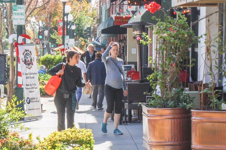 People checking out Monrovia's local shops