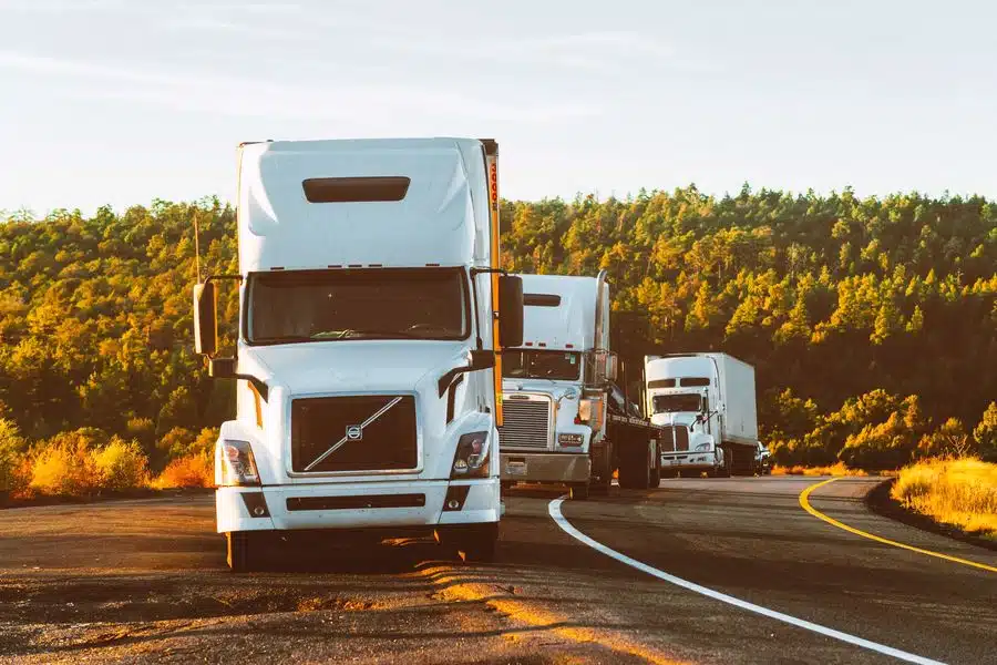 Trailers and moving trucks transporting boxes