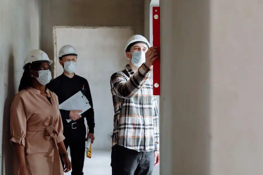 Prospective buyers inspecting a home