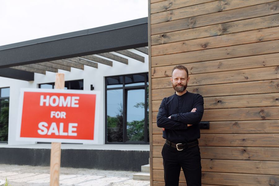 Man showing off his home that he listed for sale