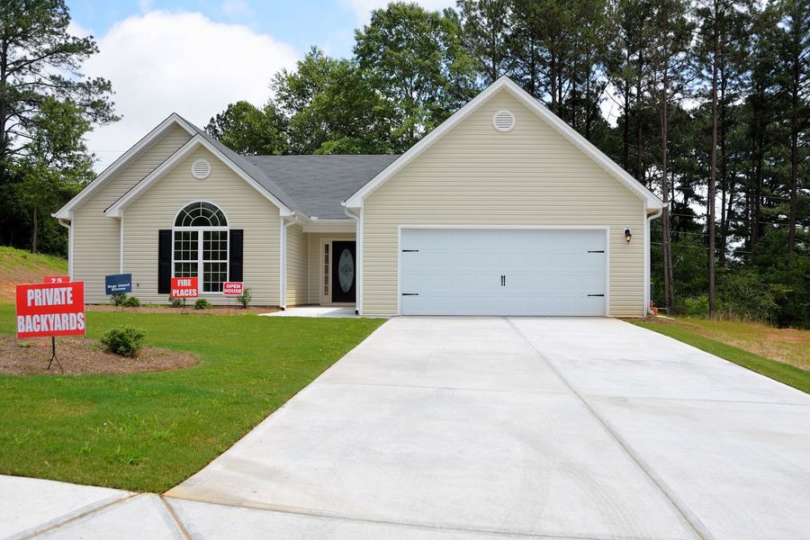 House for sale with visible sign boards